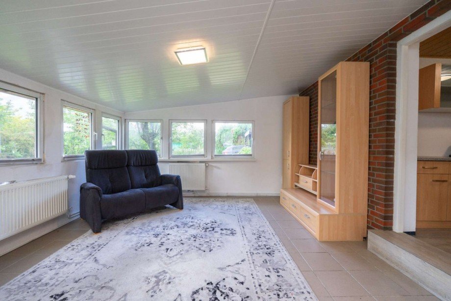 Wohnzimmer 1/2 Ferienhaus Sande